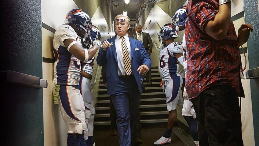 John Elway Kneeling